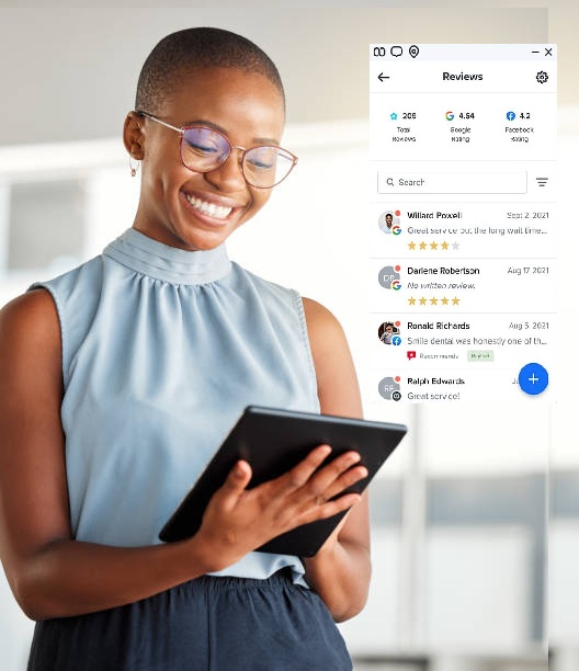 Young Happy African American business owner looking at her positive Google reviews on a tablet. This is the benefit of reputation management. 